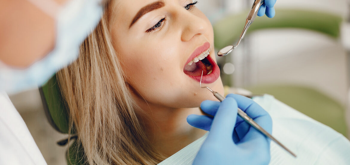 Beautiful girl sitting dentist s office 001