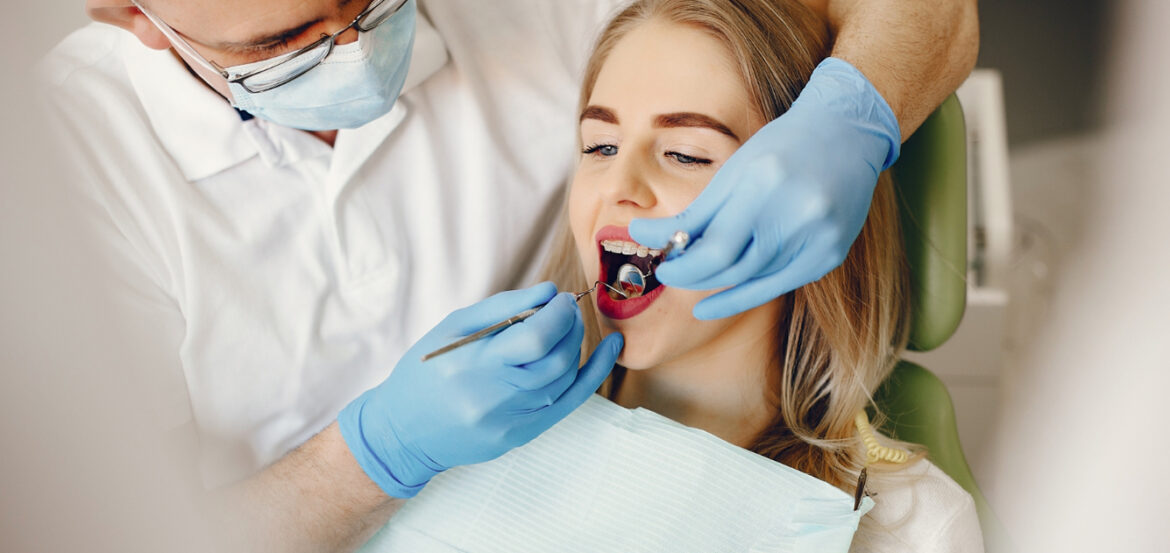 Beautiful girl sitting dentist s office